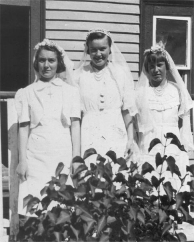 552: l-r Teresa, Cede and Reen McCarthy in Confirmation dresses. (circa 1938)  - Cede and Reen daughters of James McCarthy &amp;amp; Julia Reddy;  Teresa daughter of Thomas McCarthy &amp;amp; Elizabeth Carroll